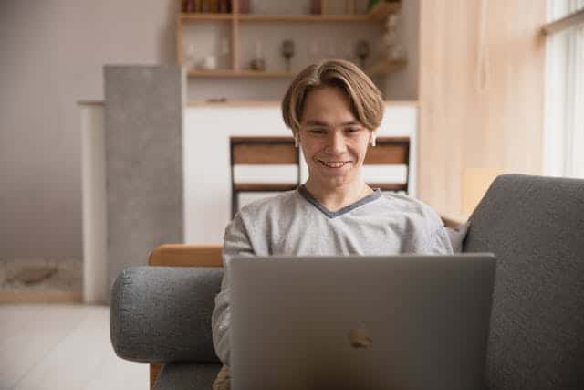 Photo Of Man Using Laptop